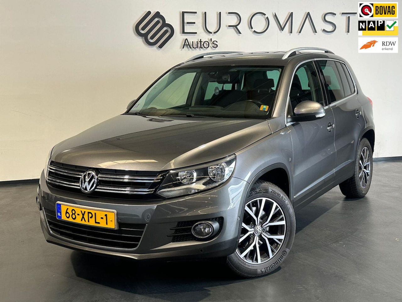 Volkswagen Tiguan - 1.4 TSI Sport&Style Navi Cruise Airco Pdc Trekhaak Nieuwe Apk - AutoWereld.nl