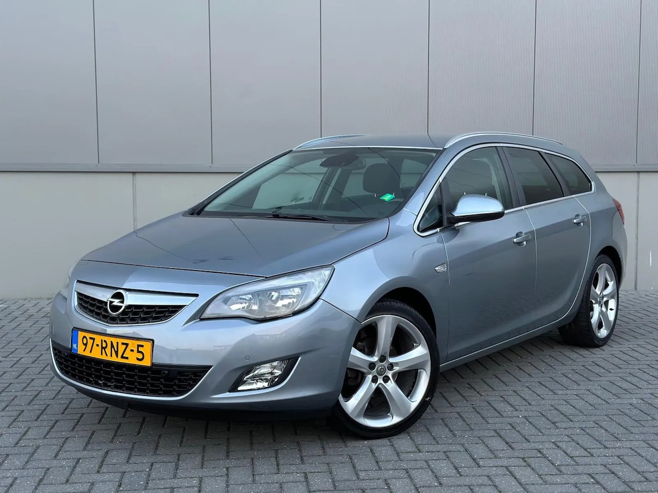 Opel Astra Sports Tourer - 1.4 Turbo Sport 1.4 Turbo Sport - AutoWereld.nl