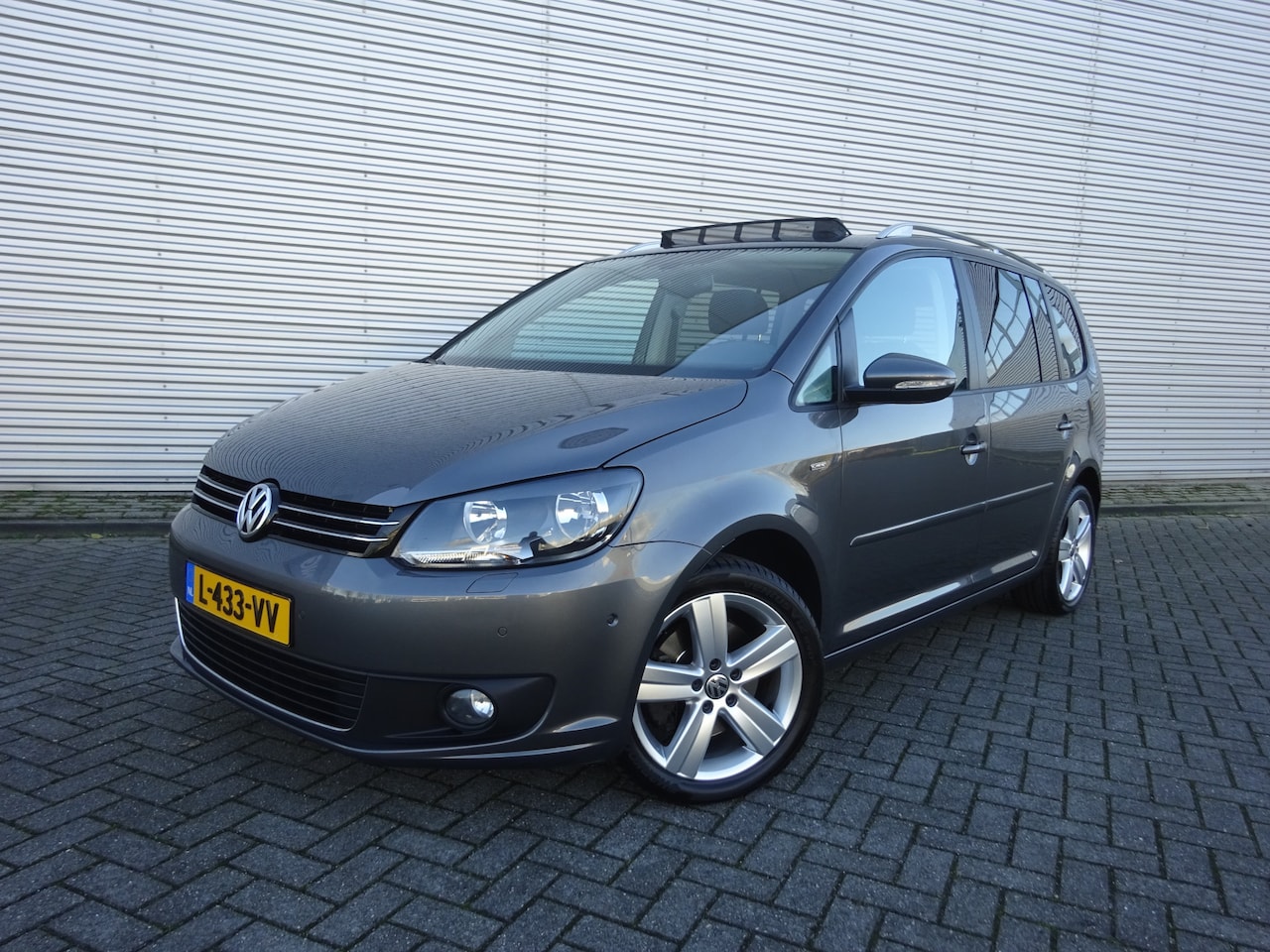 Volkswagen Touran - 1.4 TSI Highline Automaat / Panoramadak / Cruise control / Lm velgen - AutoWereld.nl