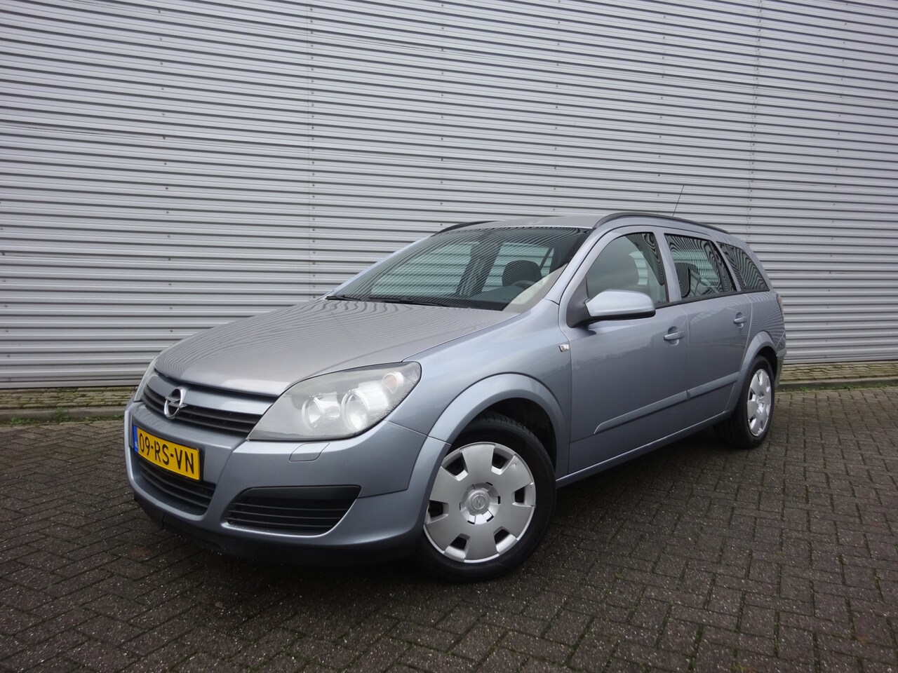 Opel Astra Wagon - 1.6 Enjoy Airco / Cruise control / NAP - AutoWereld.nl