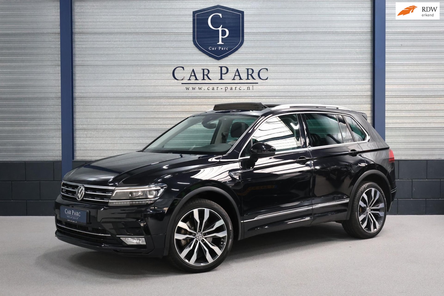 Volkswagen Tiguan - 2.0 TSI 4Motion R-LINE LED/VIRTUAL/PANO/LEER+S.VERWARMING+MEMORY/20" LMV/PDC/LINE/ACC/ECC/ - AutoWereld.nl