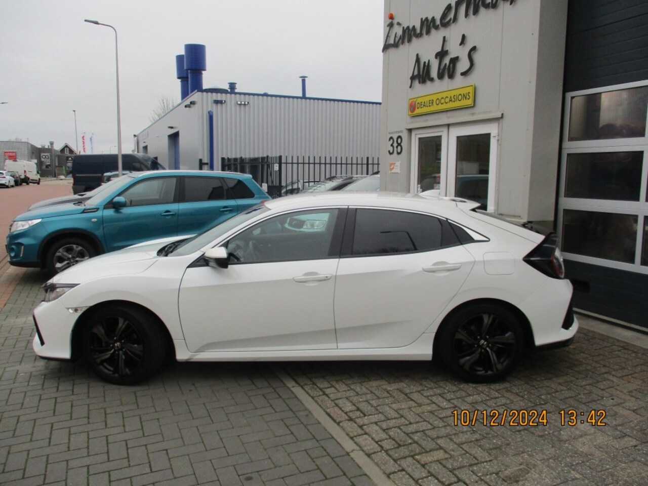 Honda Civic - 1.0 i-VTEC Elegance 1.0 I-VTEC ELEGANCE - AutoWereld.nl