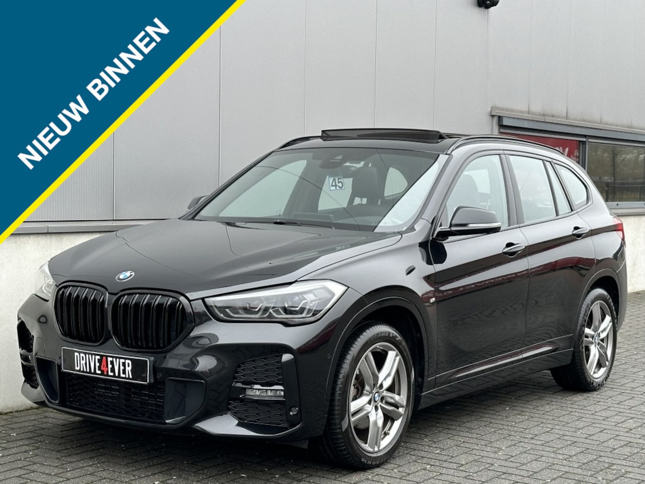 BMW X1 - sDrive18i M PACK 2022 PANO NAVI CR CONTROL CAMERA CLIMATE CONTRO - AutoWereld.nl