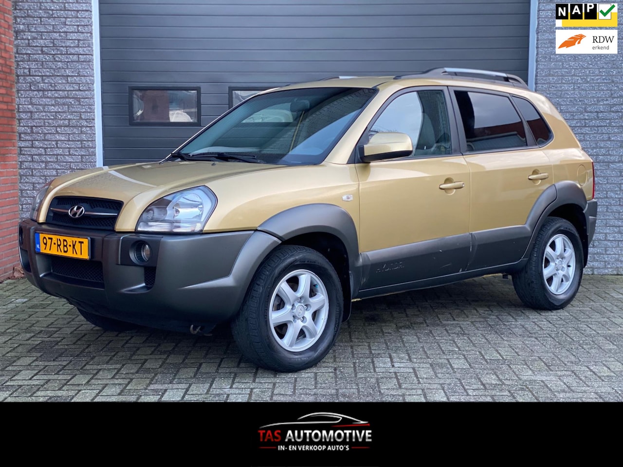 Hyundai Tucson - 2.0i Dynamic 1e EIG / AIRCO / CRUISE / NAP - AutoWereld.nl