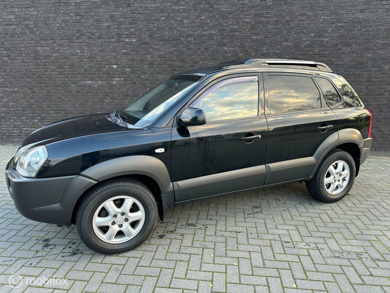 Hyundai Tucson - 2.0 CRDI|Grijskenteken|Uniek|Airco|Cruise|PDC - AutoWereld.nl