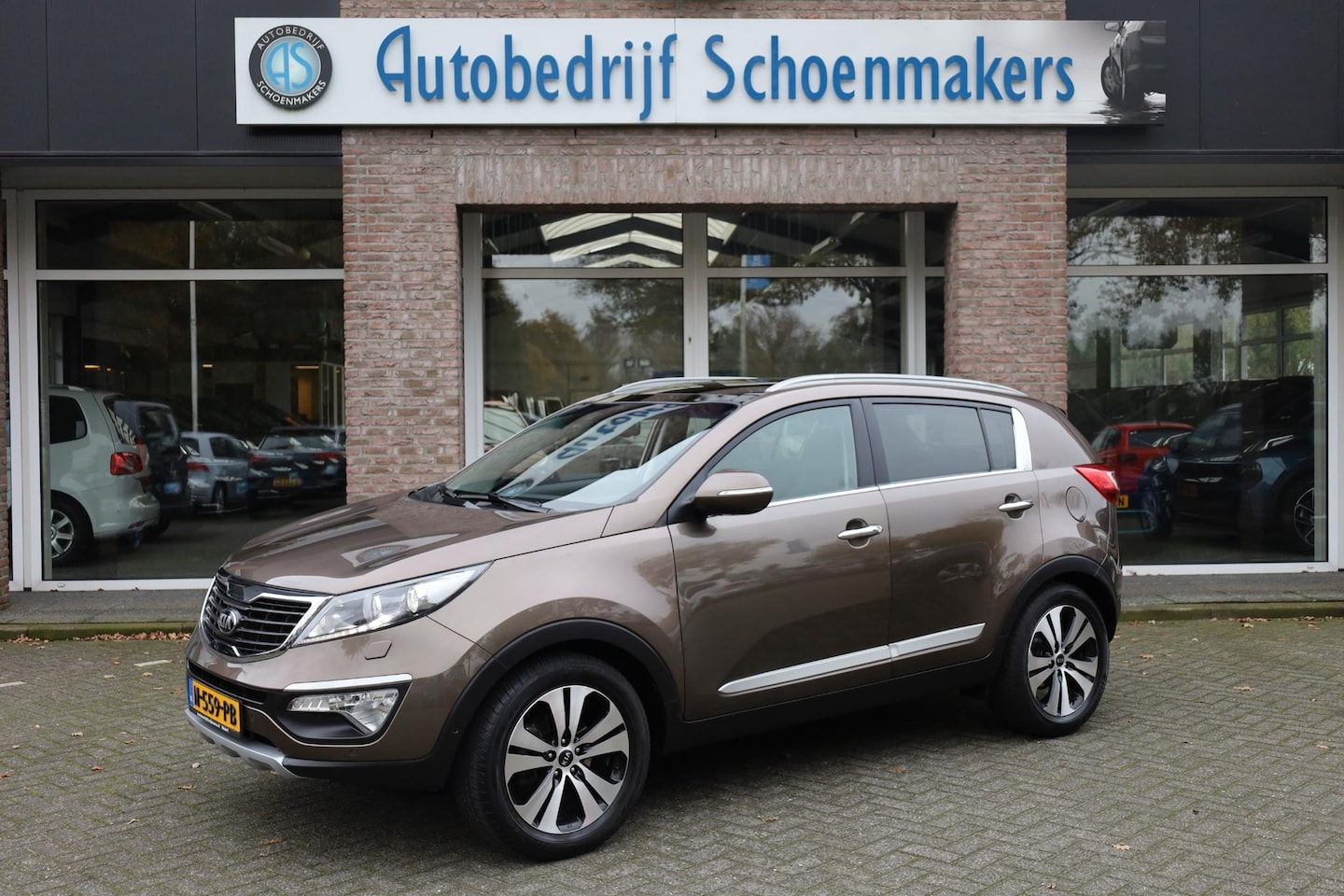 Kia Sportage - 2.0 Super Pack LEER CAMERA PANO 4xSTOELVERWARMING 2xPDC CRUISE NAVI CLIMA 18"LMV KEYLESS - AutoWereld.nl