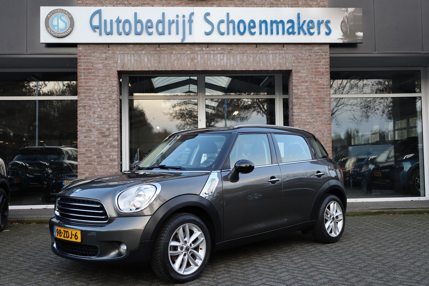 MINI Countryman - Mini 1.6 Cooper Edition LEER STOELVERWARMING NAVI SFEERVERLICHTING CRUISE 17"LMV PDC CLIMA - AutoWereld.nl