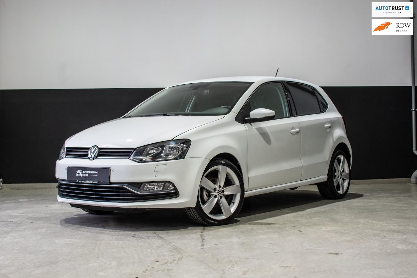 Volkswagen Polo - 1.2 TSI Highline Automaat|Camera|Stoelverwarming|Clima - AutoWereld.nl