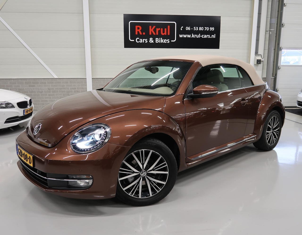 Volkswagen Beetle Cabriolet - 1.4 TSI Design Automaat Leer Xenon Airco-ecc Navigatie Cruise control PDC Stoelverwarming - AutoWereld.nl