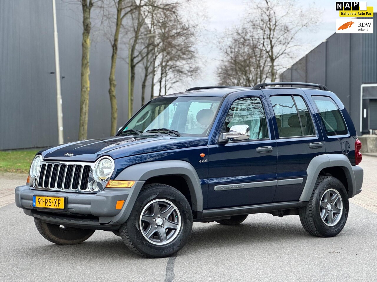 Jeep Cherokee - 3.7 V6 Sport/4X4/AUT/NAVI/AIRCO/TREKHAAK/ZEER NETTE STAAT - AutoWereld.nl