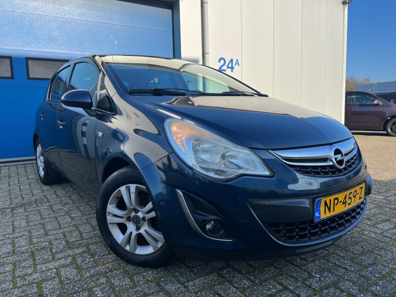 Opel Corsa - 1.2-16V Cosmo 2012 Half Leer Cruise Airco - AutoWereld.nl