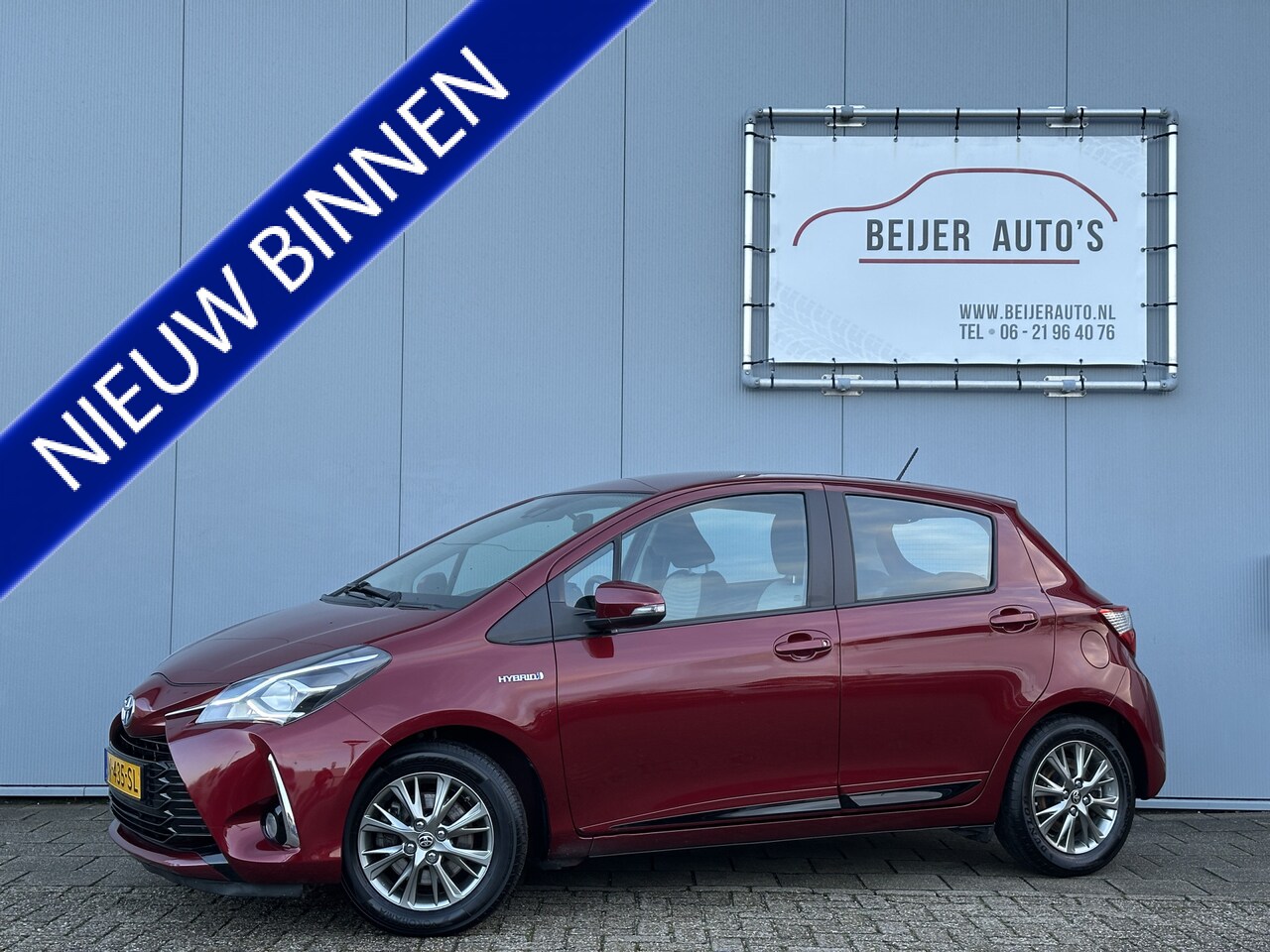 Toyota Yaris - 1.5 Hybrid Design Red Automaat Climate/15inch. - AutoWereld.nl