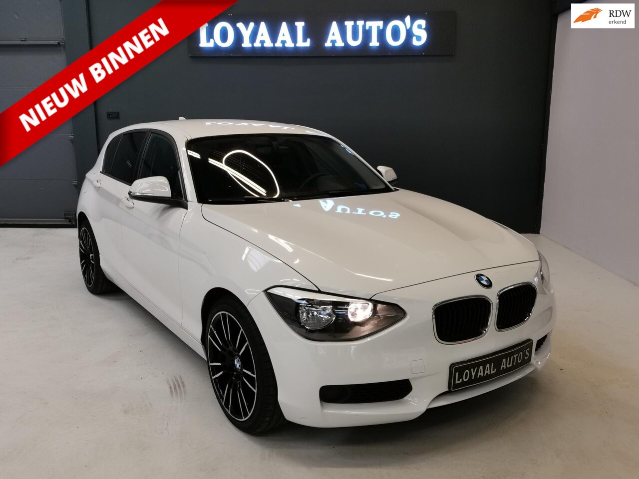 BMW 1-serie - 114i EDE |AIRCO|CRUISE|PDC|ELEK.RAMEN|APK. - AutoWereld.nl