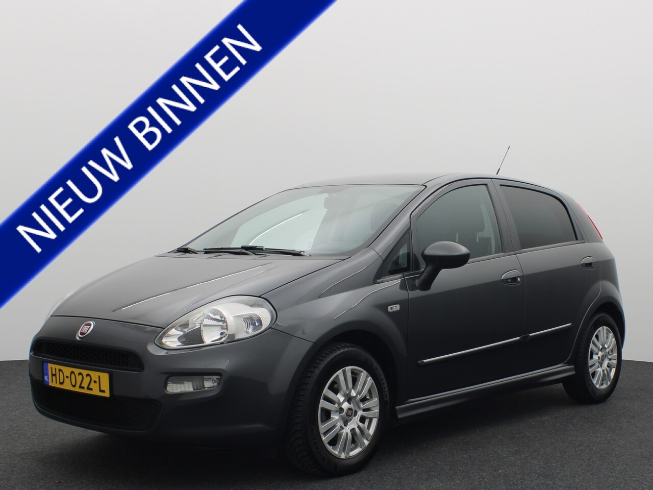 Fiat Punto Evo - 1.3 M-Jet Street AIRCO / CRUISE / BLUETOOTH /  SIDE-SKIRTS / PDC / LMV / LEUKE AUTO! - AutoWereld.nl