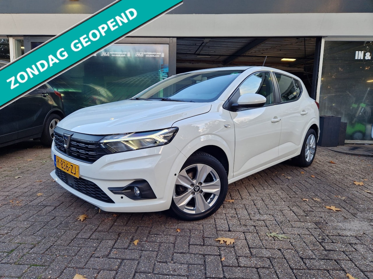 Dacia Sandero - 1.0 TCe 100 Bi-Fuel | 1E EIGENAAR | 12MND GARANTIE | CRUISE | LPG-G3 | NAVI | - AutoWereld.nl