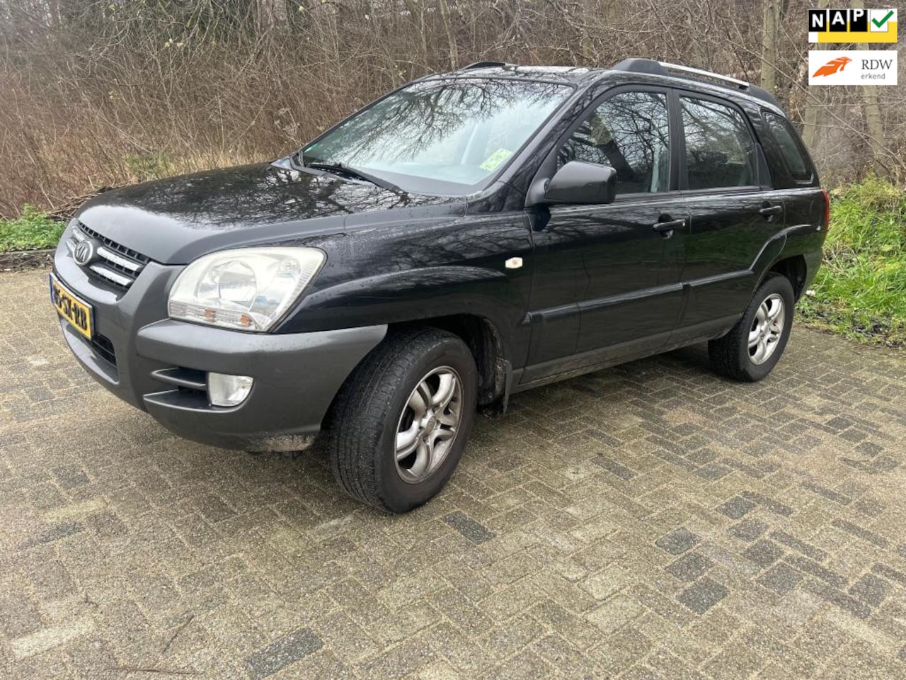 Kia Sportage - 2.0 CVVT Executive 2.0 CVVT Executive - AutoWereld.nl