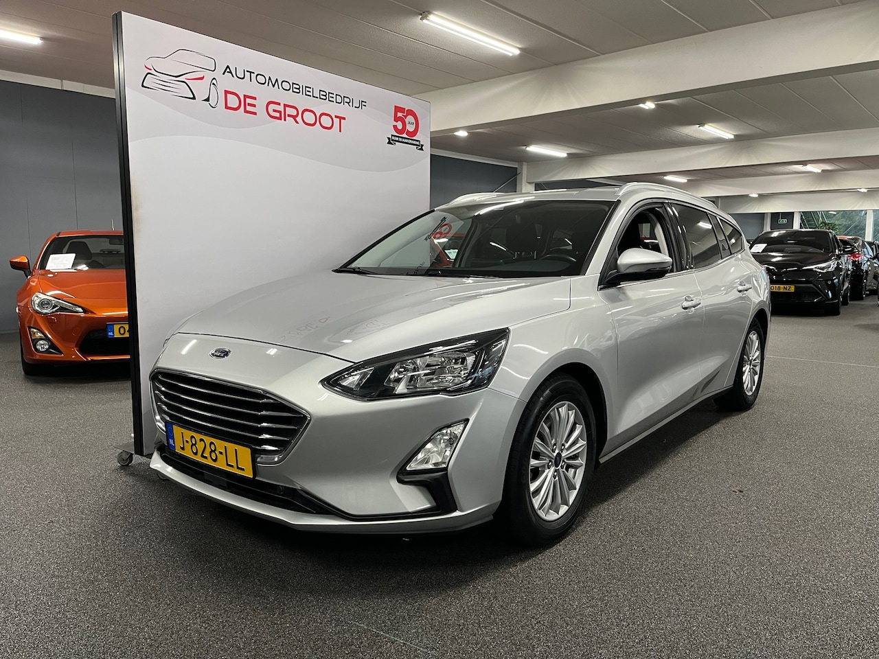 Ford Focus Wagon - 1.0 EcoBoost Hybrid Titanium X Business / 1 ste eigenaar - AutoWereld.nl