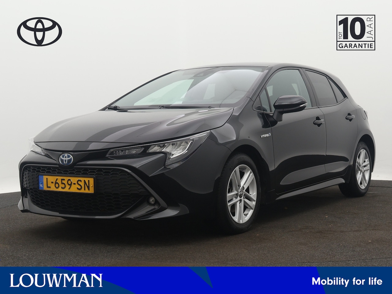 Toyota Corolla - 1.8 Hybrid Active | Stoel en stuurwiel verwarmd | Draadloze telefoonlader | LM velgen | Ca - AutoWereld.nl