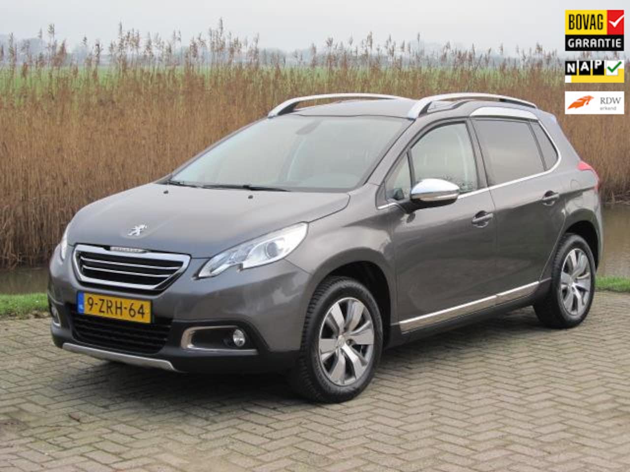 Peugeot 2008 - 1.2 PureTech Allure Panorama - AutoWereld.nl