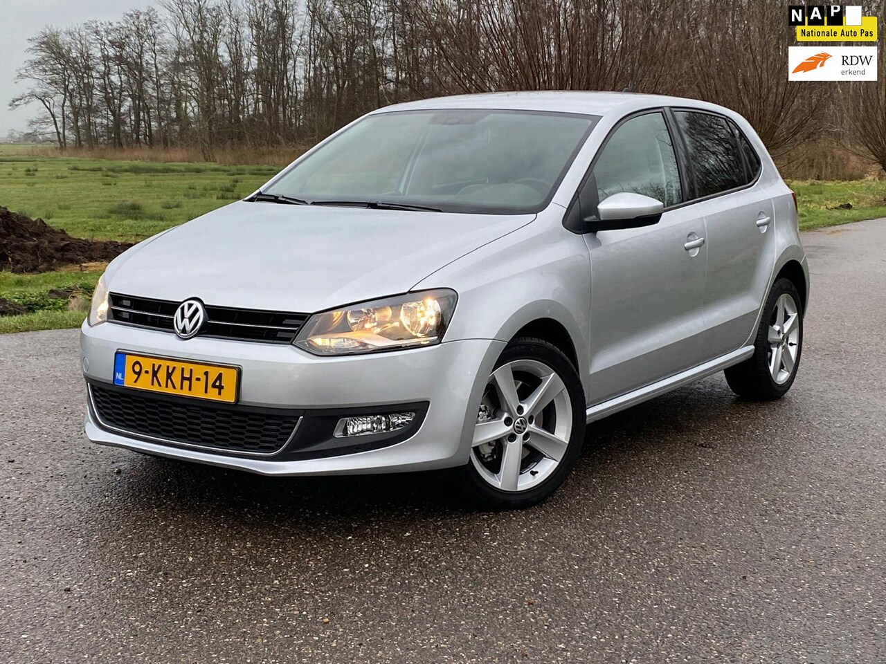 Volkswagen Polo - 1.2 TSI BlueMotion Highline / Automaat / 14.295 KM / Navigatie / Climate Control / Cruise - AutoWereld.nl