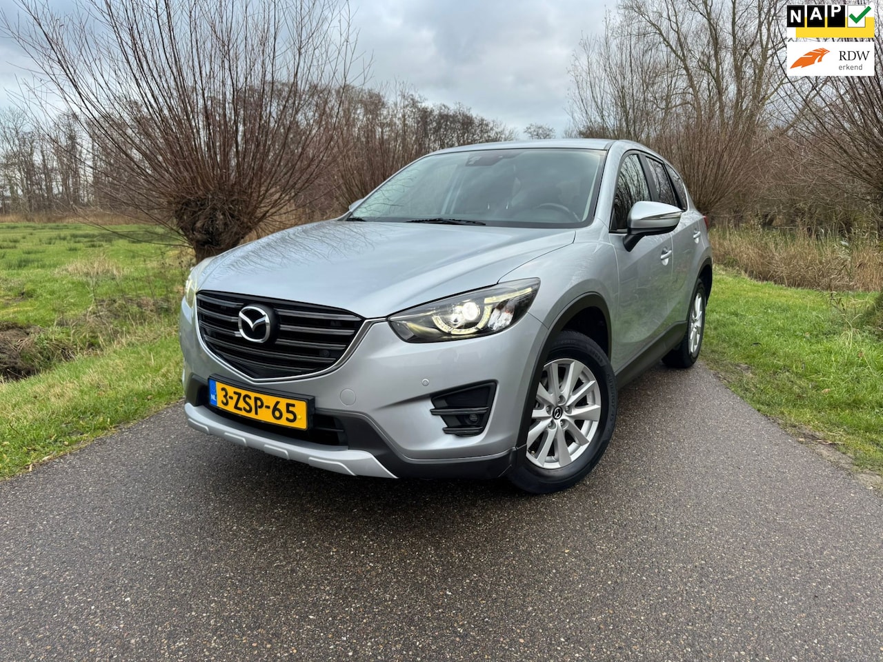 Mazda CX-5 - 2.0 SkyActiv-G 165 Skylease GT 2WD / Airco / Navi / Elektrische Voorstoel / Leder / PDC / - AutoWereld.nl