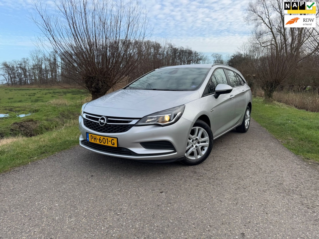 Opel Astra Sports Tourer - 1.0 Online Edition / Incl. BTW / Airco / Navi / PDC / Goed Recent Onderhoud / Keurige Auto - AutoWereld.nl