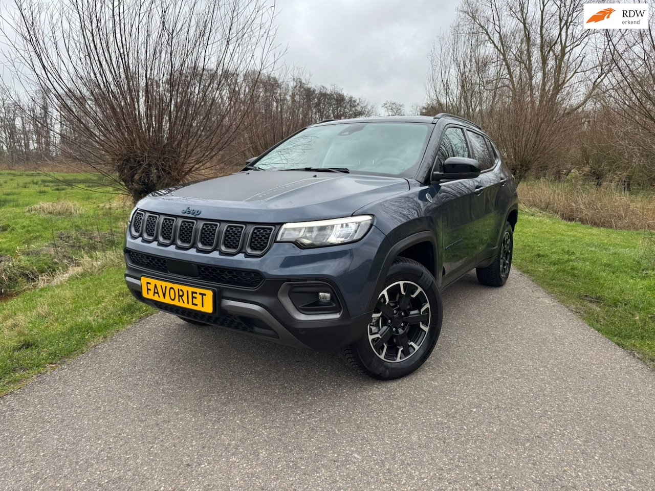 Jeep Compass - 4xe 240 Plug-in Hybrid Electric Trailhawk / BTW Auto / Airco / Navi / Camera / Leder / 2 L - AutoWereld.nl