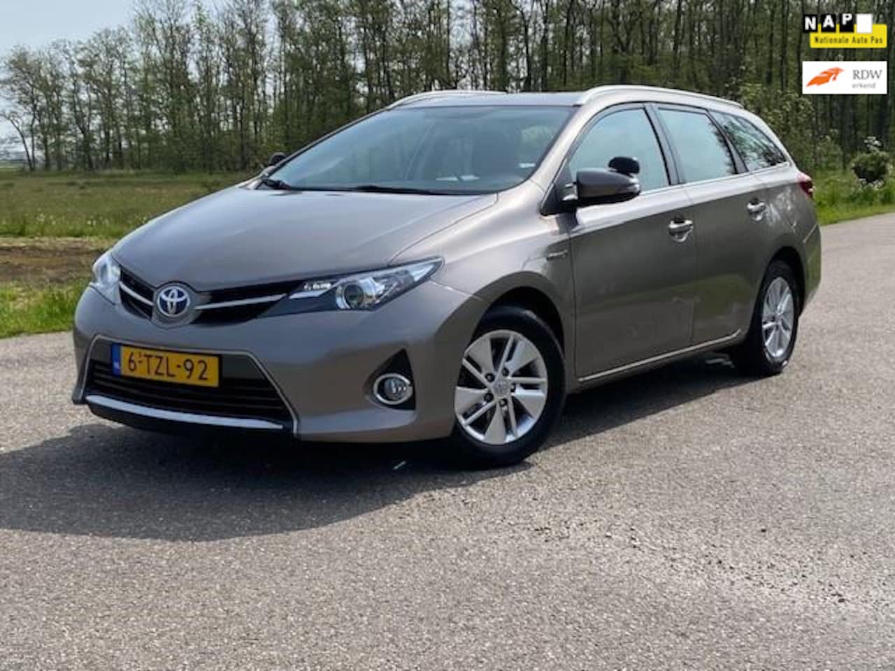 Toyota Auris Touring Sports - 1.8 Hybrid Aspiration AUTOMAAT NAVI NAP GOED ONDERHOUDEN - AutoWereld.nl