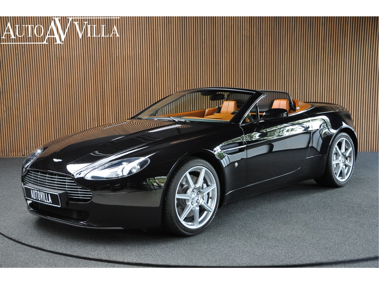 Aston Martin V8 Vantage Roadster - 4.3 V8 Sportshift Aut 385pk Bi-xenon Navi Memorypakket Bluetooth LM velgen 19'' Leer PDC - AutoWereld.nl