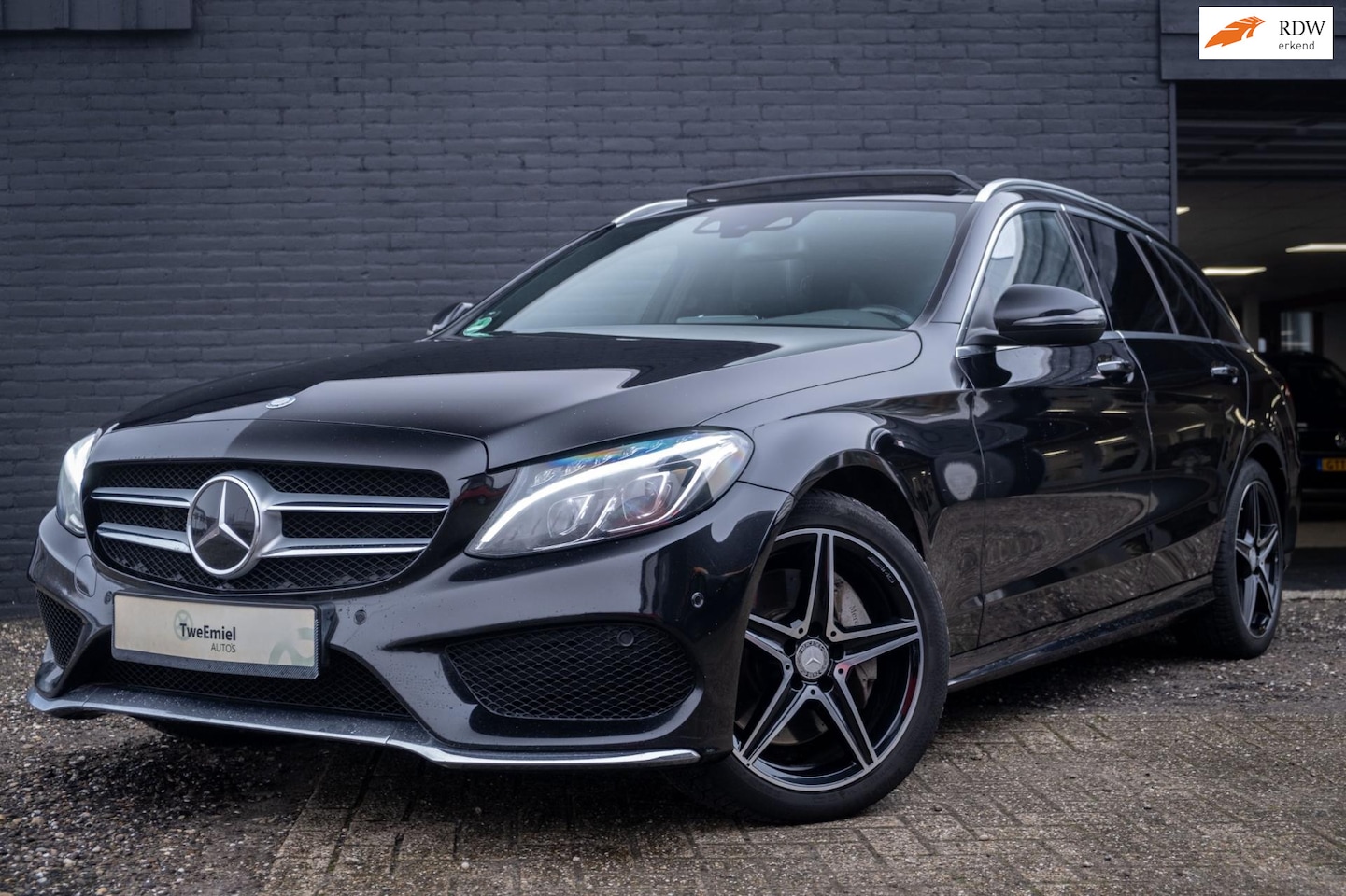 Mercedes-Benz C-klasse Estate - 400 4MATIC AMG | Carbon | Head up | Sfeer - AutoWereld.nl