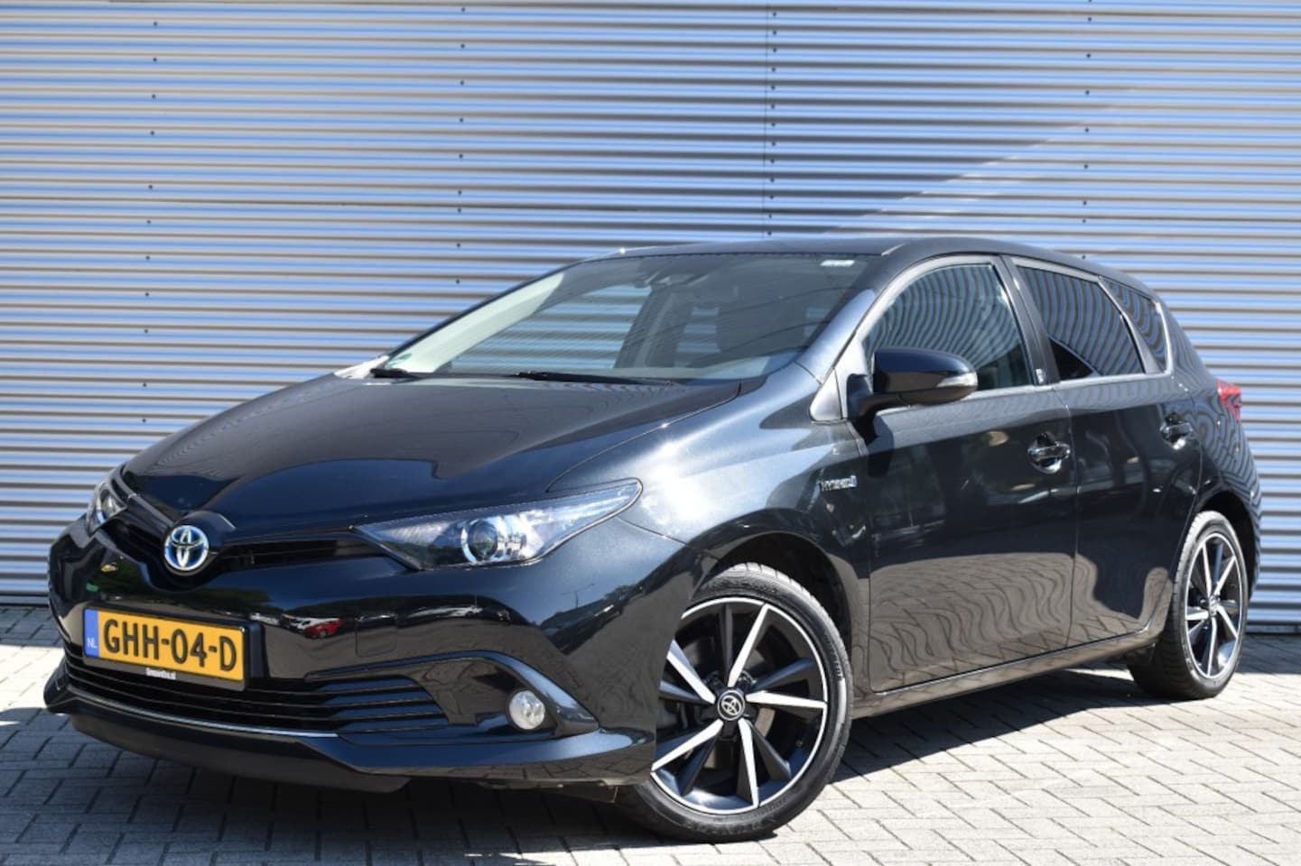 Toyota Auris - 1.8 HYBRID DYN. ULT. / CRUISE / KYLESS / P.CAMERA - AutoWereld.nl