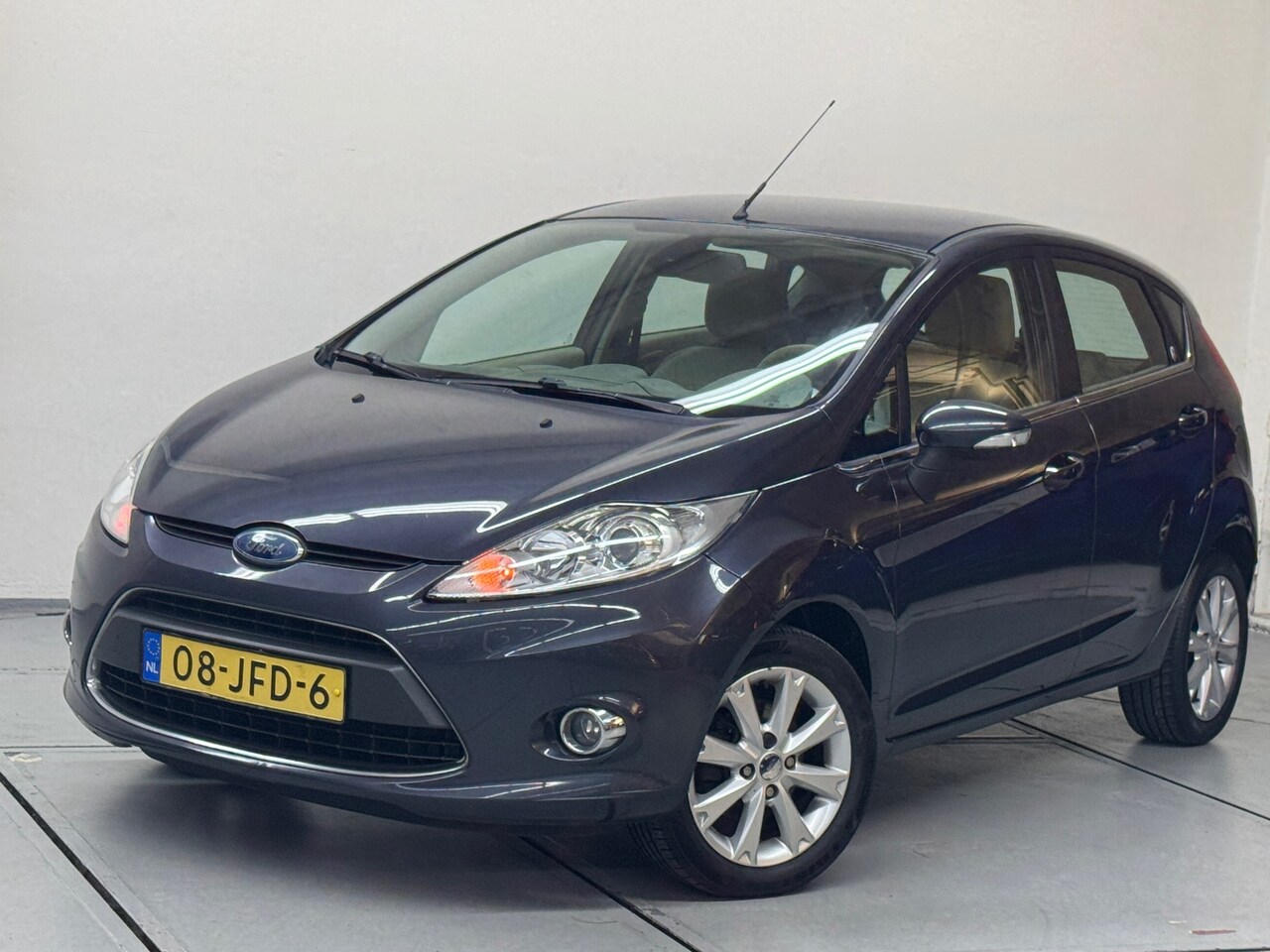 Ford Fiesta - 1.25 Ghia Airco Cruise Pdc - AutoWereld.nl