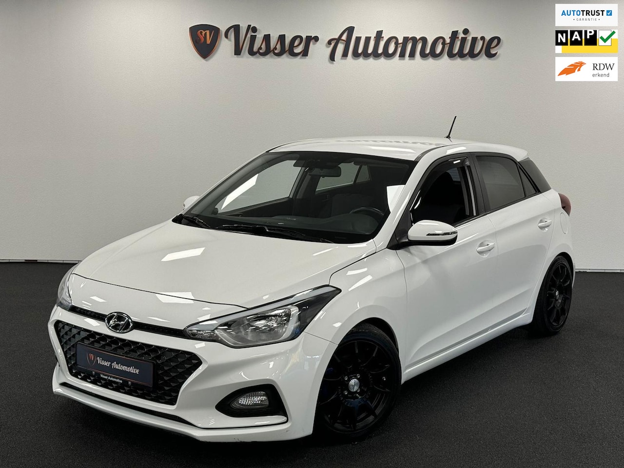 Hyundai i20 - 1.2 HP i-Motion Premium*Airco*Sport Edition*Navi* - AutoWereld.nl