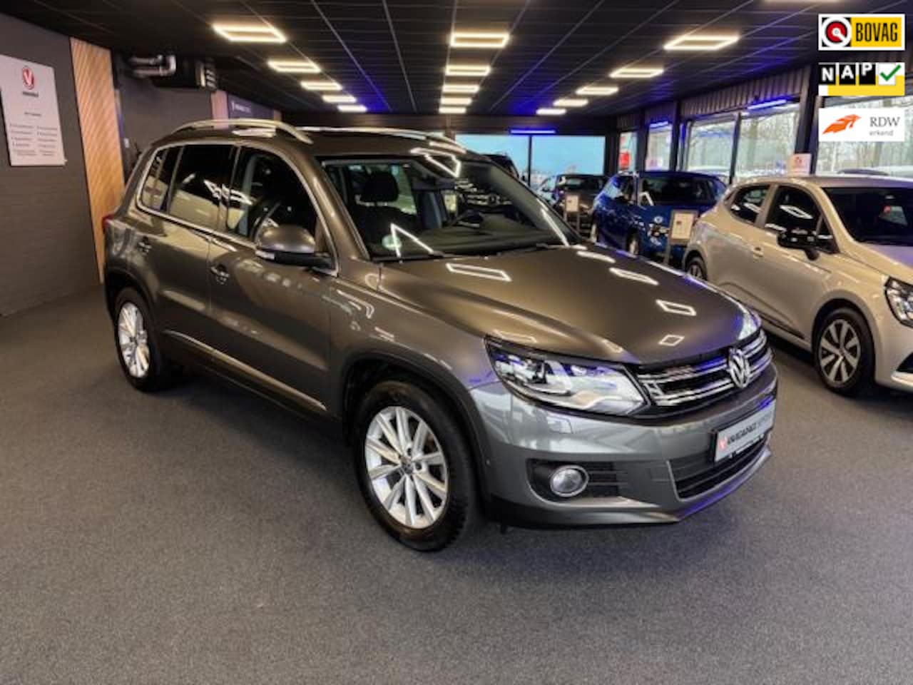 Volkswagen Tiguan - 1.4 TSI Sport&Style | Clima | Cruise | Navi |LED Dagrij | Slechts 116.000 KM | Org. NL. Au - AutoWereld.nl