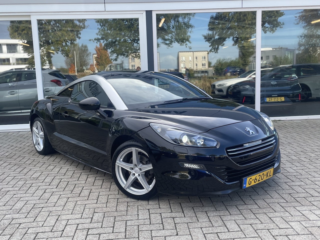 Peugeot RCZ - 1.6 THP 50% deal 4.975,- ACTIE Xenon / Half leder / Stoelverwarming / Navi / PDC - AutoWereld.nl