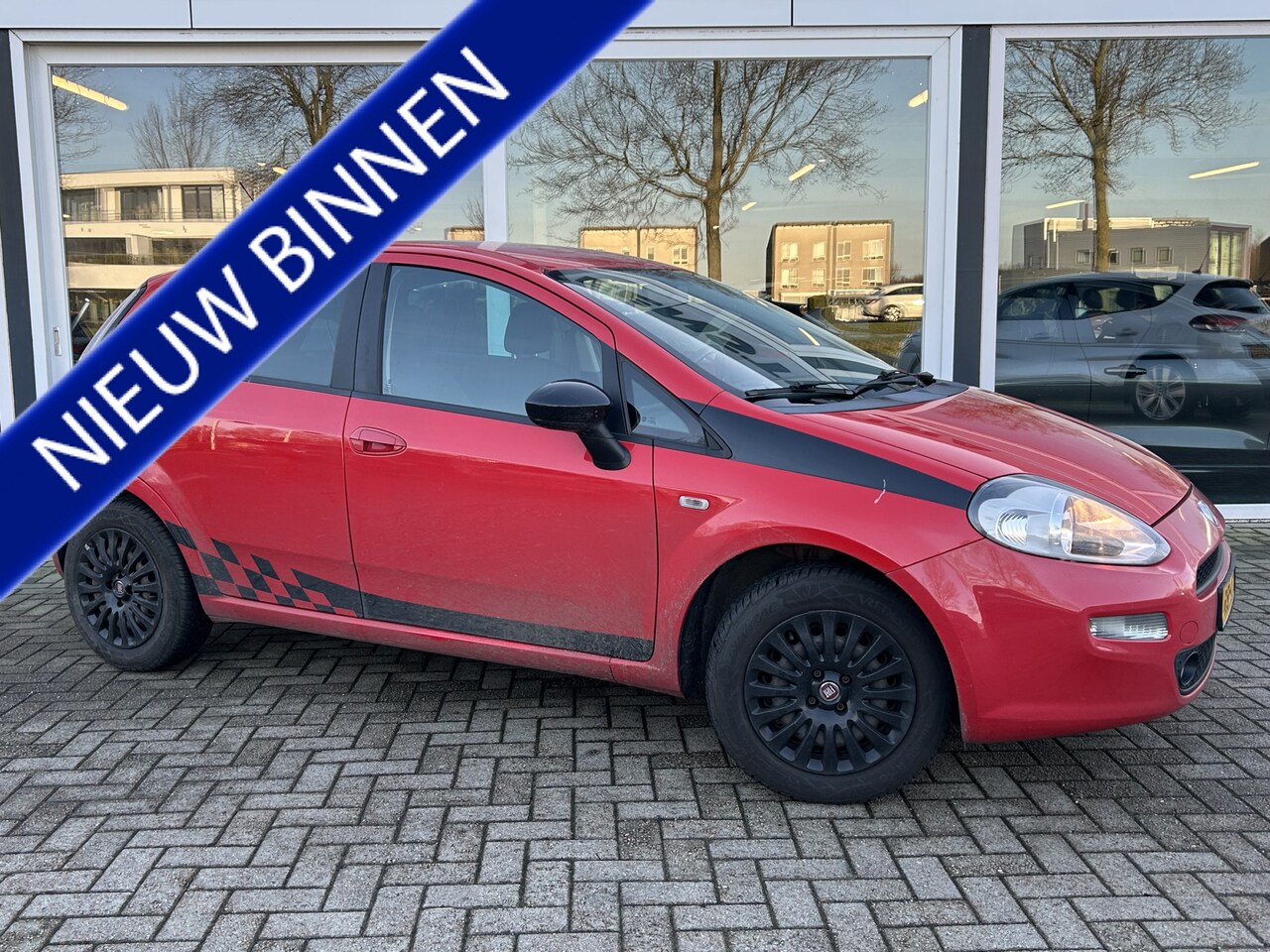 Fiat Punto Evo - 1.2 Street 50% deal 1.975,- ACTIE Trekhaak / Cruise / Airco / 5-Deurs / PDC / Distributie - AutoWereld.nl