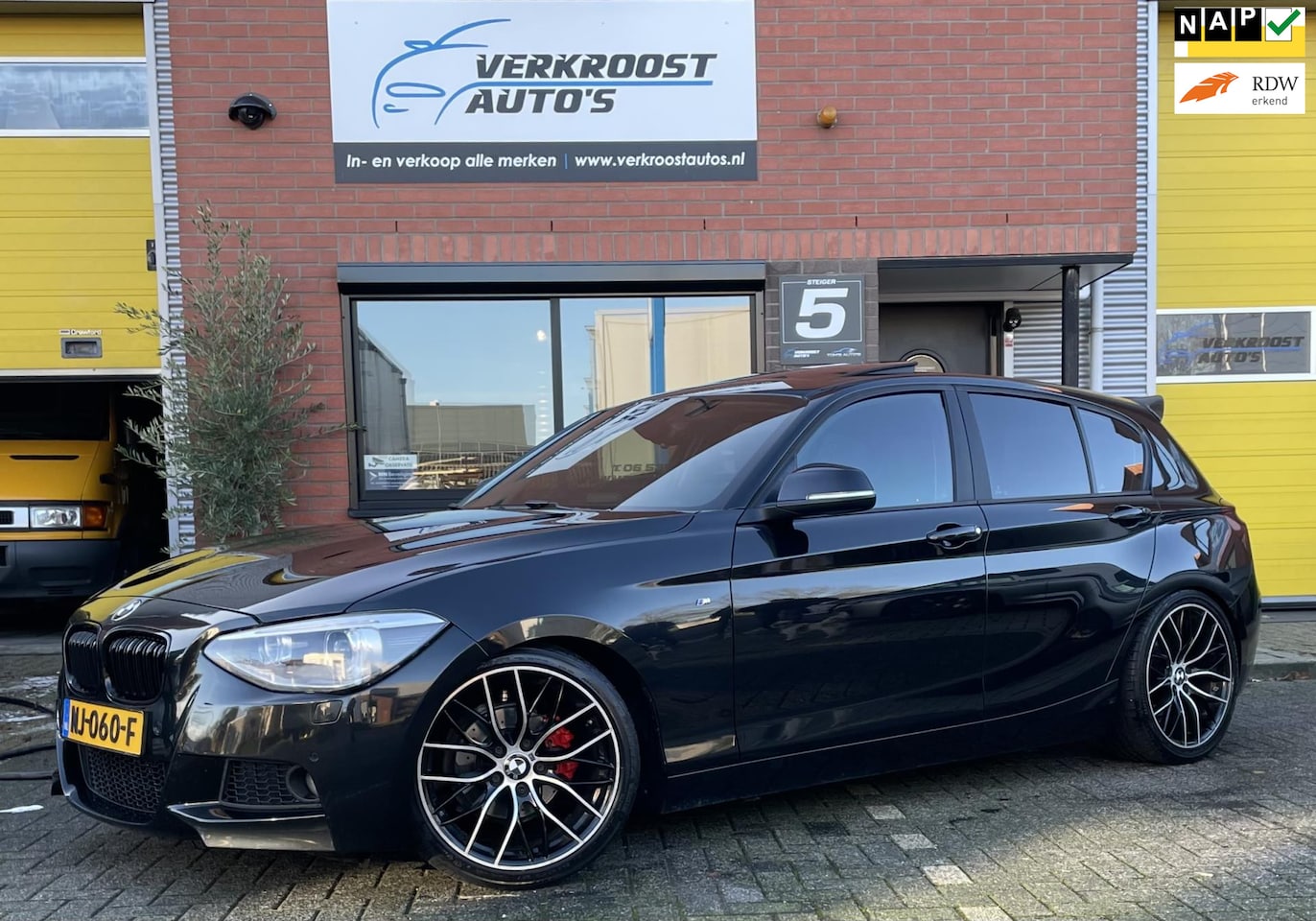 BMW 1-serie - 116i High Executive. schuifdak. stoelverwarming. leder. navi - AutoWereld.nl