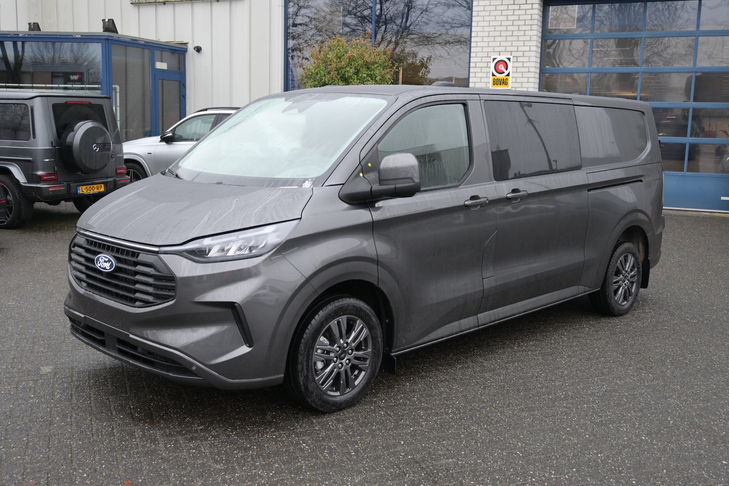 Ford Transit Custom - 320L 2.0 TDCI L2H1 Limited DC Premium pakket, Trekhaak, Adaptive cruise control - AutoWereld.nl