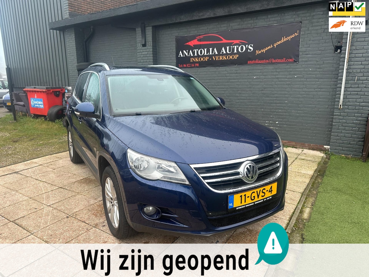 Volkswagen Tiguan - 2.0 TSI Sport&Style 4Motion *APK*AIRCO* - AutoWereld.nl