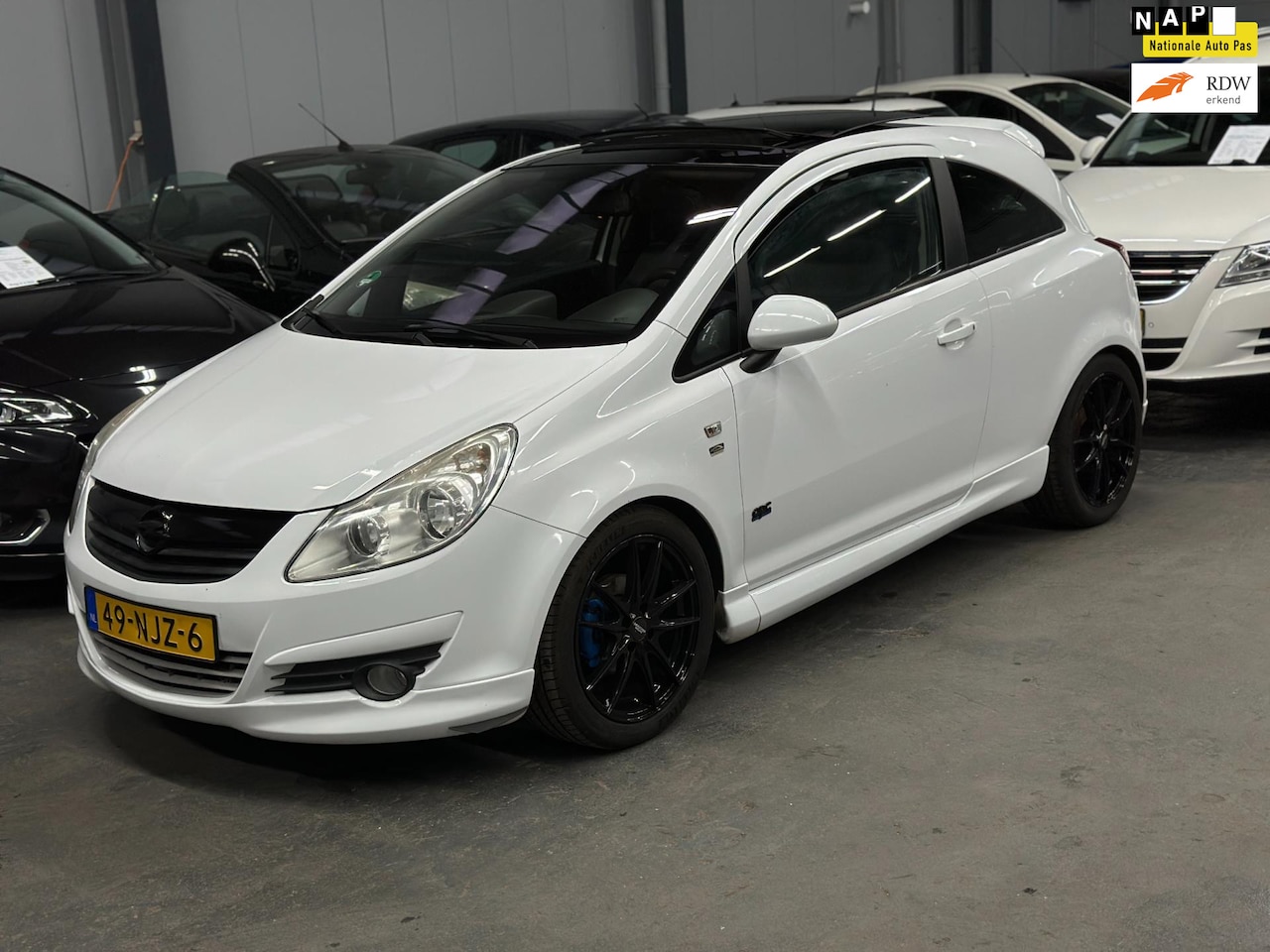 Opel Corsa - 1.4-16V Cosmo OPC Sport Uitlaat Nieuwe APK NAP - AutoWereld.nl