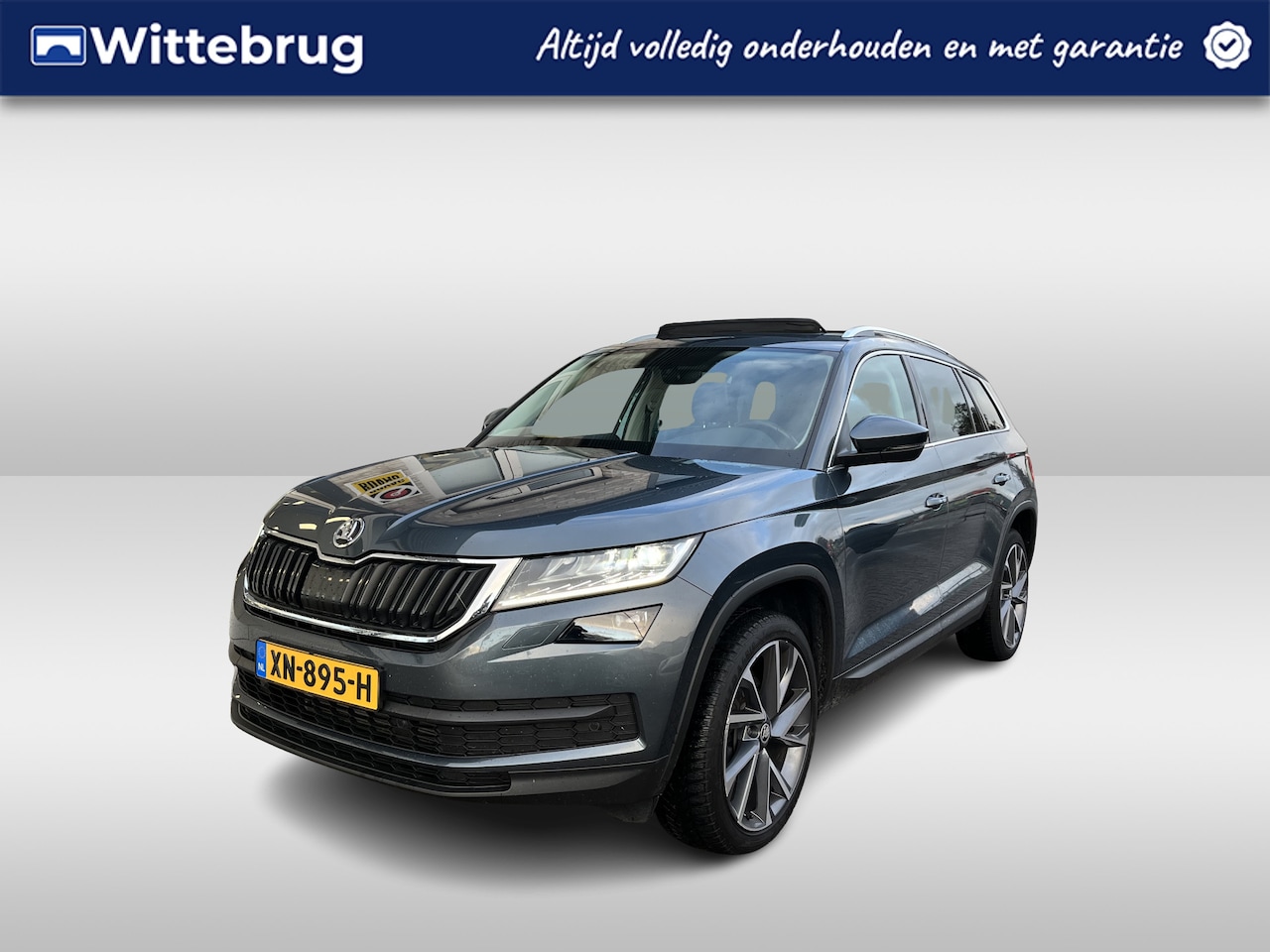 Skoda Kodiaq - 1.5 TSI Style 7p. / AUTOMAAT/ 7 ZITTER/ PANO/ TREKHAAK/ CAMERA/ PARK. SENSOREN/ LED/ STOEL - AutoWereld.nl