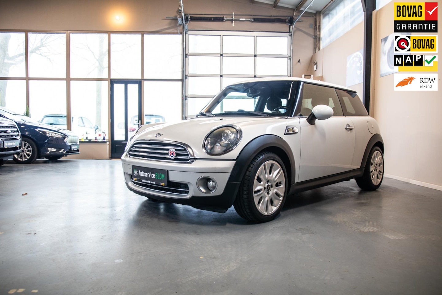 MINI Cooper - Mini 1.6 speciale jubileum uitvoering - AutoWereld.nl