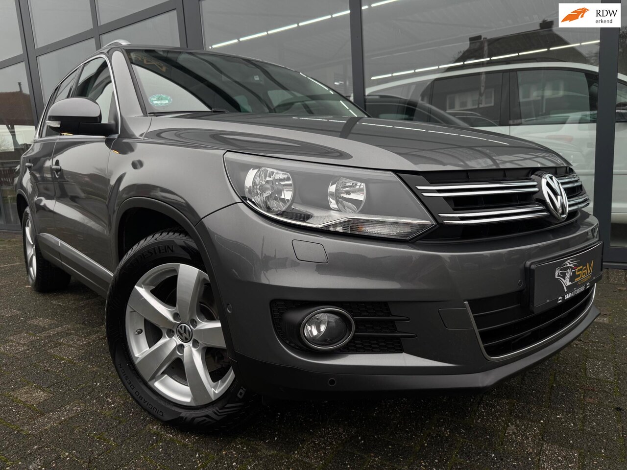 Volkswagen Tiguan - 1.4 TSI Sport&Style - AutoWereld.nl