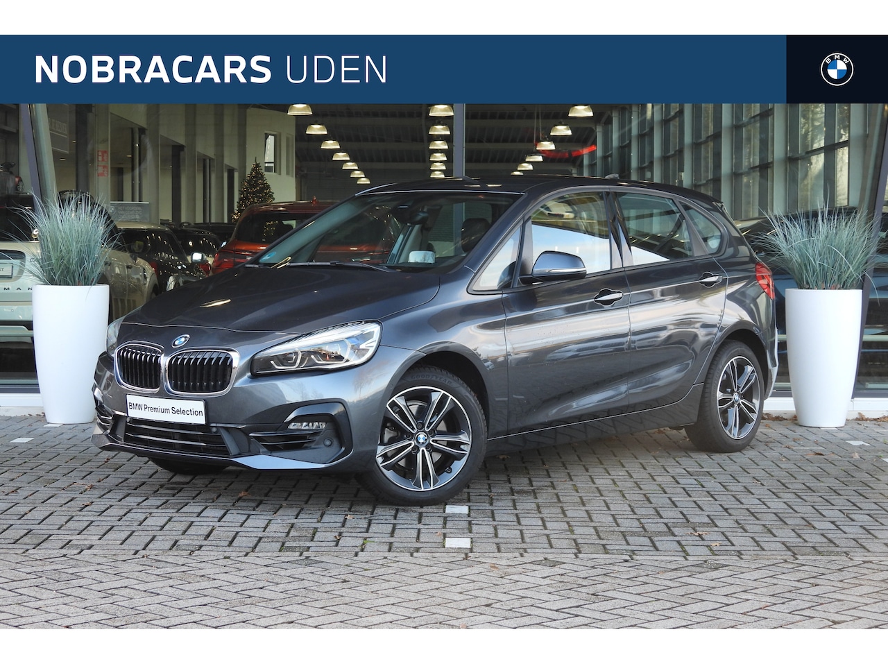 BMW 2-serie Active Tourer - 218i High Executive Sport Line Automaat / Sportstoelen / Stoelverwarming / Achteruitrijcam - AutoWereld.nl