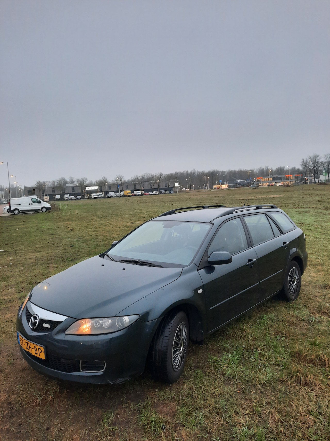 Mazda 6 Sportbreak - 2.0i Touring - AutoWereld.nl