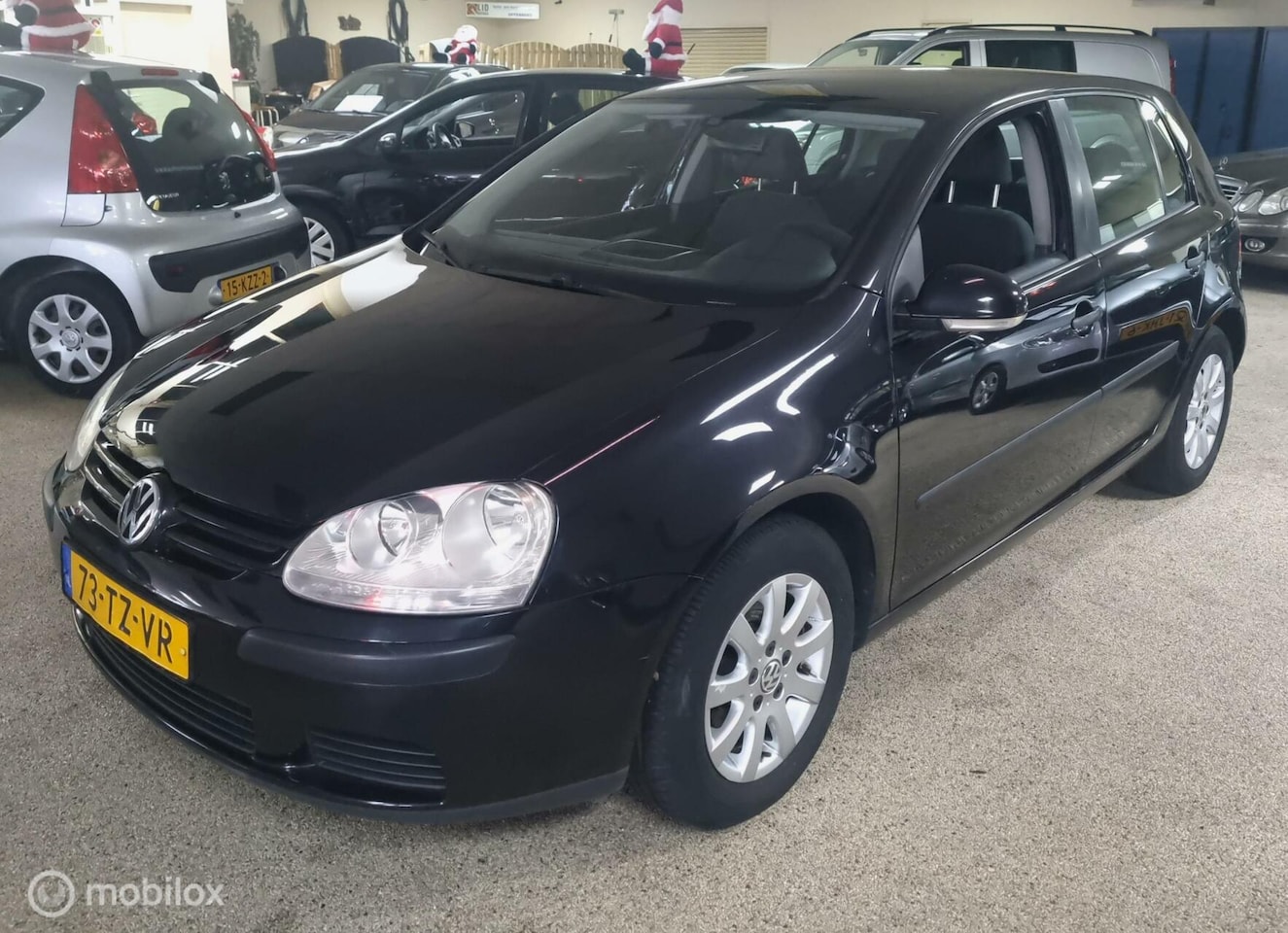 Volkswagen Golf - 1.6 FSI Comfort Business airco 5 deurs. - AutoWereld.nl