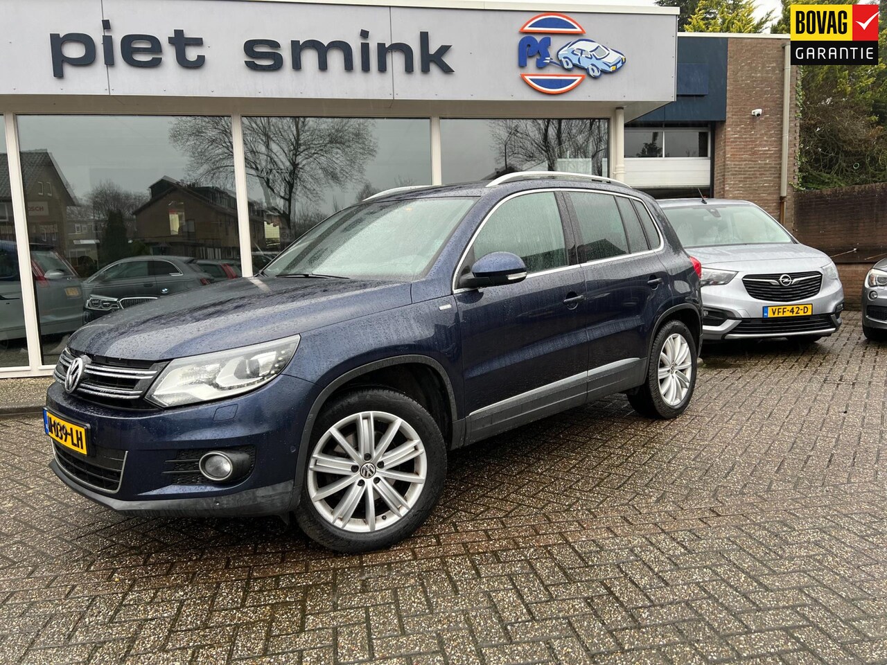 Volkswagen Tiguan - 1.4 TSI Sport&Style - AutoWereld.nl