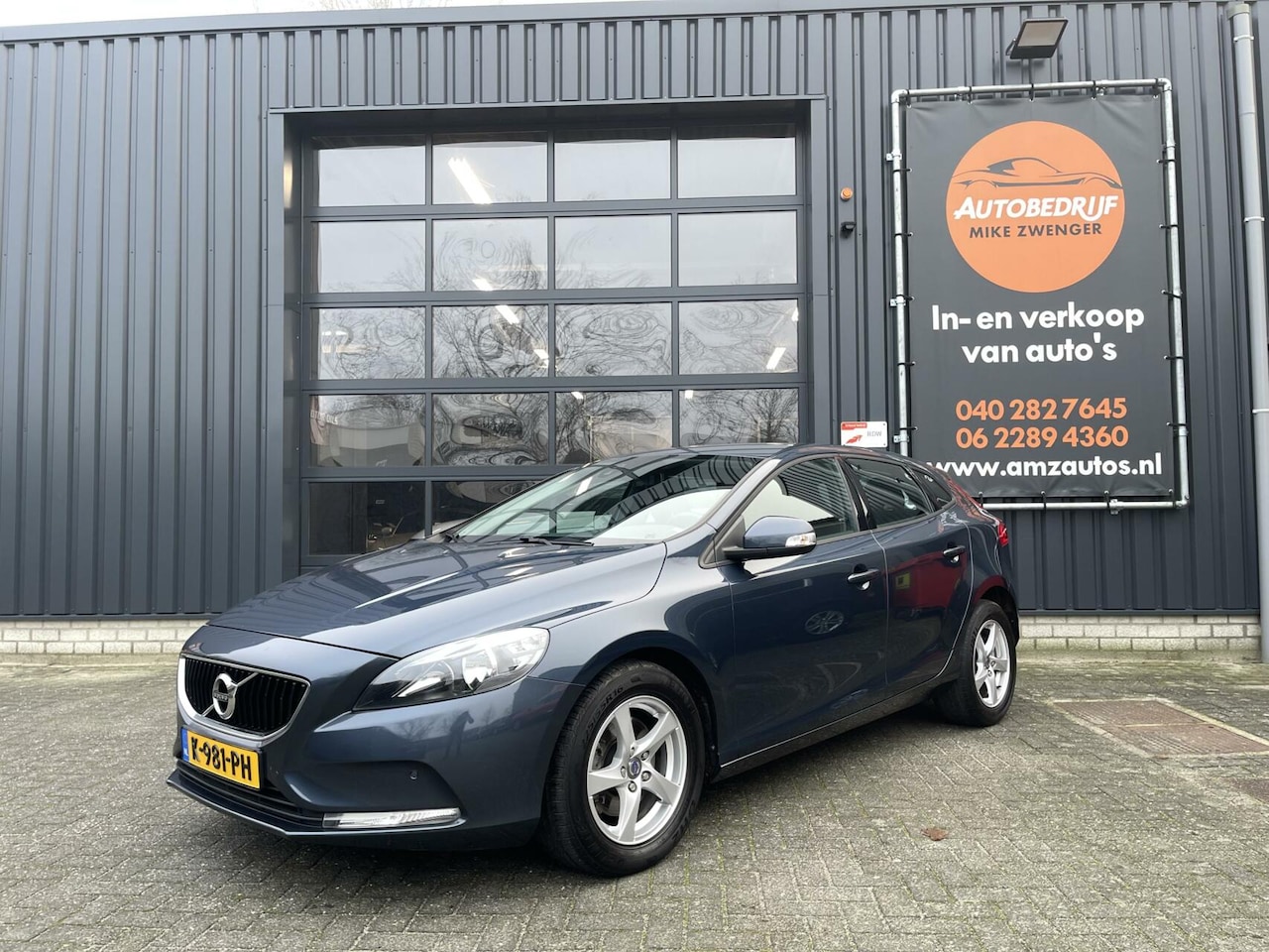 Volvo V40 - 2.0 T2 Base NAVIGATIE|BLUETOOTH|PARK ASSIST|CRUISE CONTROL|DEALER ONDERHOUDEN - AutoWereld.nl