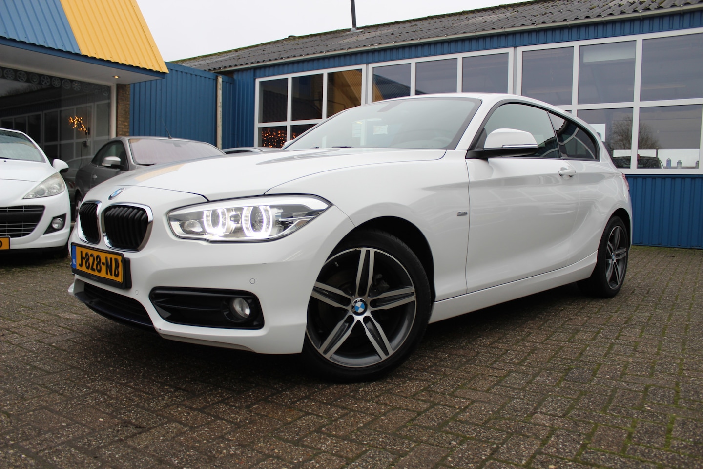 BMW 1-serie - 116i "Sport Edition" Xenon - Cruise - Navi !!! - AutoWereld.nl