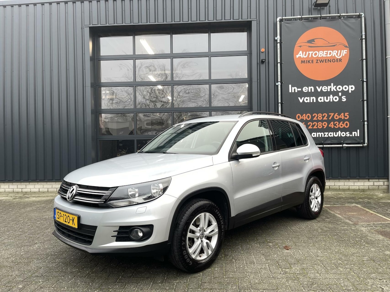 Volkswagen Tiguan - 1.4 TSI Sport&Style NAVIGATIE|TREKHAAK|STOELVERWARMING|CRUISE CONTROL|BLUETOOTH|STUURBEDIE - AutoWereld.nl